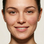 Close-up of a person with a neutral expression on a beige background